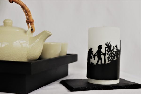 Handicraft candle by Schulthess Kerzen from Switzerland. White color with a metallic ring
