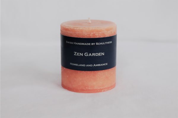 Handicraft scented candle by Schulthess Kerzen from Switzerland. Orange color with floral scent